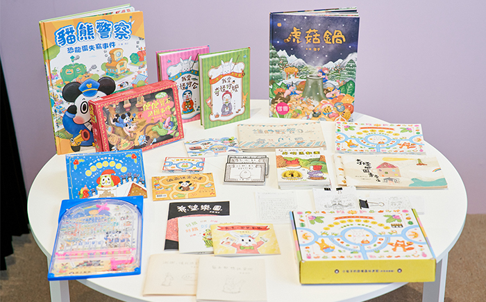 信子除了單純的繪本創作,也可以將「遊戲書」概念注入繪本中。